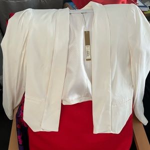 NEW Dressy Crop Jacket fully lined with two front slit pockets. Size 10.